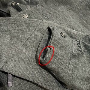 damage on burton snowboard jacket listed below